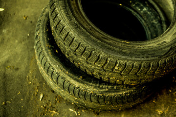 Old tires stacked, Close-up Broken tire damaged, A bunch of old tires from used cars.