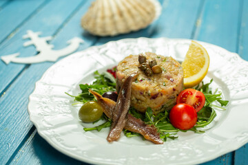 tartar spread with fish, anchovies and vegetables
