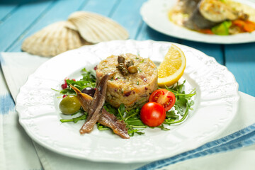 tartar spread with fish, anchovies and vegetables