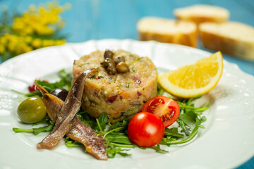 tartar spread with fish, anchovies and vegetables