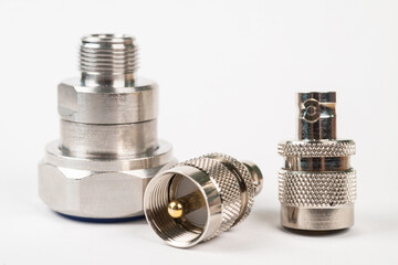 High frequency connectors component with a shiny copper nickel plating covering