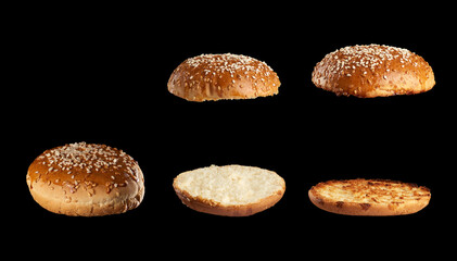 set of baked sesame seed buns: whole, halves and grilled halves, black background