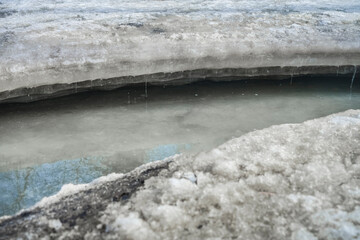 Turquoise layered ice on the river. Layered turquoise ice on the river. South Ural  Russia. Ice...