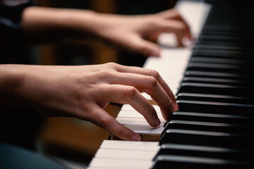 Obraz premium young woman performer hands playing piano.
