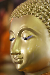 Closer look on peaceful face of Lord Buddha.