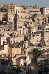 Fototapeta na wymiar Matera, Basilicata,Italy - July 31 2020 Panoramic view of the ancient town of Matera (Sassi di Matera). European Capital of Culture 2019, UNESCO World Heritage Site.