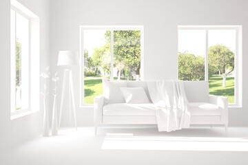 Obraz na płótnie Canvas Stylish room in white color with sofa and green landscape in window. Scandinavian interior design. 3D illustration