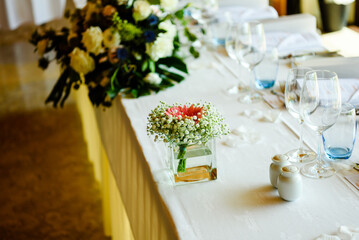 Closeup on table set for an event party or wedding reception lovely background.