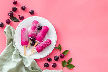 Fresh cherry berries ice cream. Popsicles overhead view