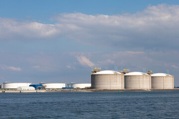 White and grey oil storage tanks 