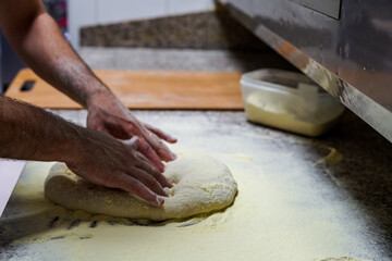 preparation of pizza in pala