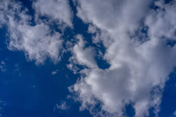 Blue cloudy sky. Background for PC and laptop. Sky replacement for other photos.