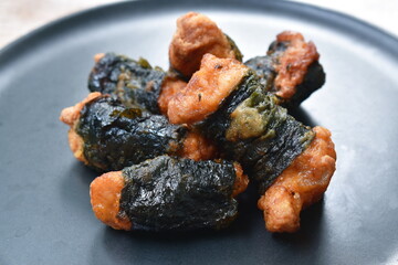 fried salty chicken roll seaweed arranging on plate © pedphoto36pm