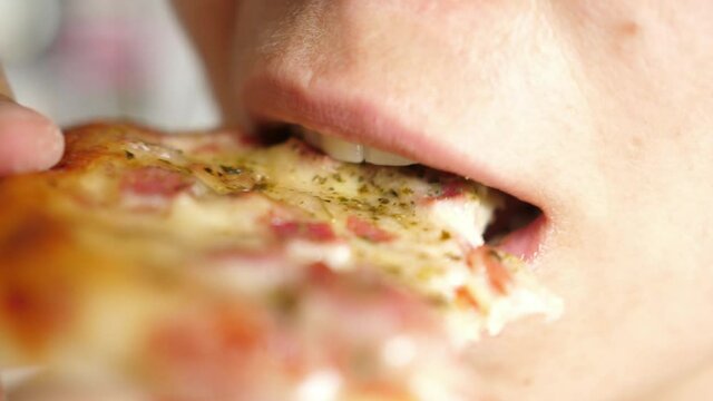 woman eat eating mouth close macro Pizza capricciosa cheese ham mushrooms
