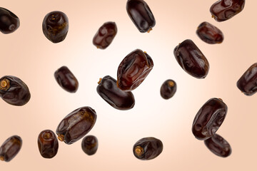 Falling delicious dates are isolated on a colored background with clipping path as package design element and advertising. Flying foods. Levitation