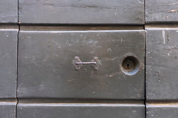 metal vintage handle on a old wooden door