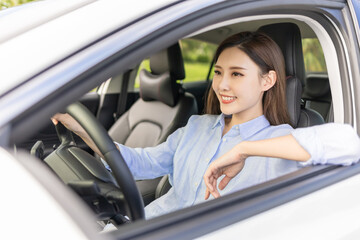 Fototapeta na wymiar Asian female driver smile
