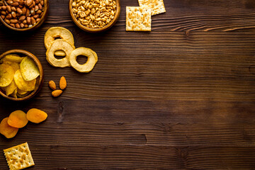 Fast food snacks collection - nuts and dried fruits top view