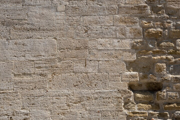 Weathered stained old brick wall background
