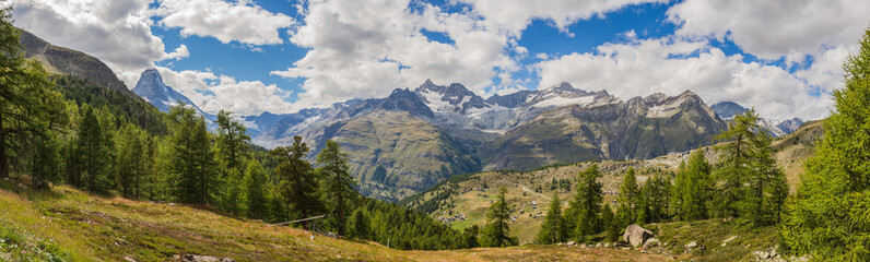 Fototapeta na wymiar Landscape of Switzerland with mountain range and forest near Zermatt, Valais canton (Panorama)