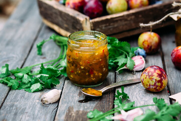 Tkemali plum sauce in a jar. Georgian sauce