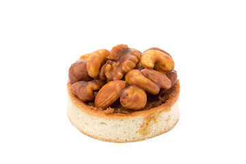 Tart with chocolate and nuts isolated on white