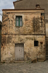 Fototapeta na wymiar old building in an alley in the old town of agricola, cilento national park, salerno province, campania, italy