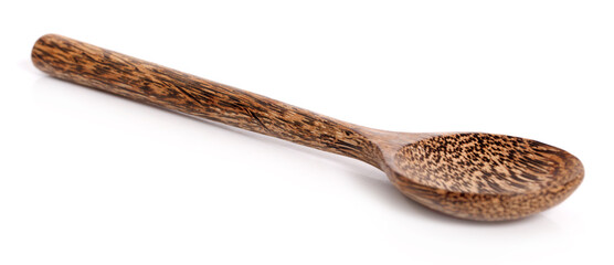 Wooden spoon on white background