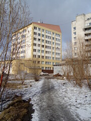 city in winter in the snow