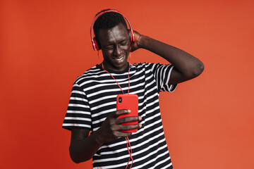 Smiling young afro american man in headphones