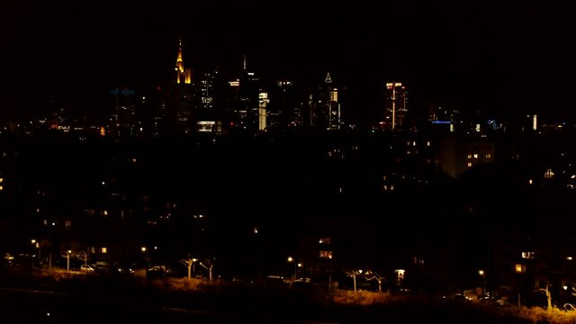 Cityscape illuminated at night, Frankfurt, Hesse, Germany