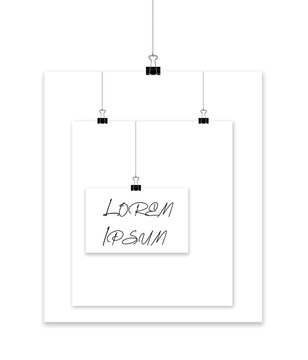 Back steel paper clamps hanging on strings hold white sheets of paper that form a unique frame for copy or art. Lorem Ipsum area available.