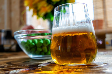 beer with nuts on the table