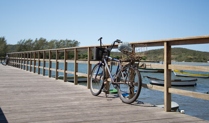 Fototapeta na wymiar Bicycle propped up on pier.