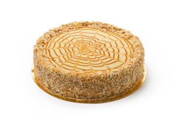 One caramel cake isolated on white background
