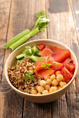 healthy salad bowl with smoked salmon, chickpea, quinoa and bulgur
