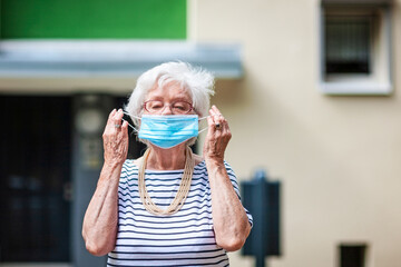Senior old woman wearing mask