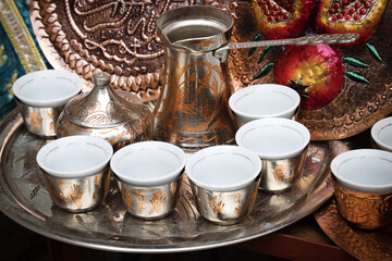 Traditional handmade souvenir from Bosnia and Herzegovina - turkish coffee pot with small copper...