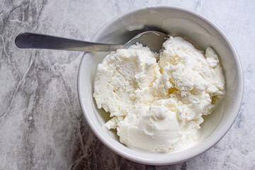Lemon ice cream in a bowl. Top view and seletive focus