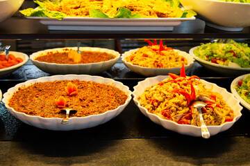 Catering food, salad in a white plate, buffet