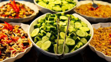Catering food, salad in a white plate, buffet