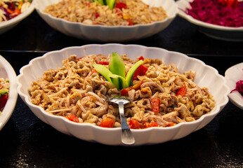Catering food, salad in a white plate, buffet