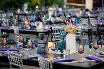 Purple flowers set up for and event.