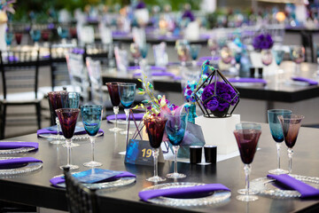 Purple flowers set up for and event.