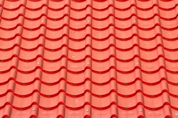 The sea wave background image was obtained from roof tiles at the pier to transport passengers across the river.