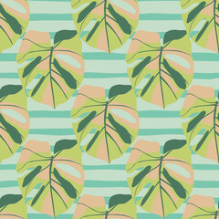Simple foliage monstera leaves seamless pattern. Green soft ornament on blue stripped background.