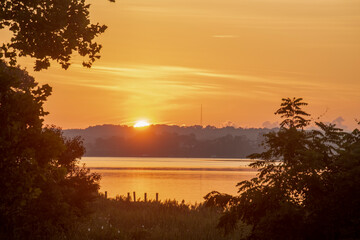 Fototapeta na wymiar Summer sunrise over Breton Bay, Leonardtown, St. Mary's County, Maryland.