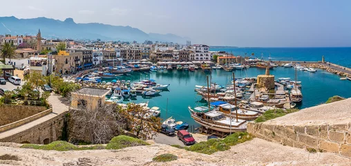 Foto op Canvas A view of old Kyrenia town and Kyrenia harbour observed from the ramparts of the old fortress © Nicola