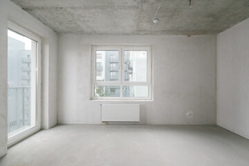 Fototapeta premium interior of the apartment without decoration in gray colors