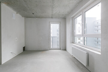 interior of the apartment without decoration in gray colors
